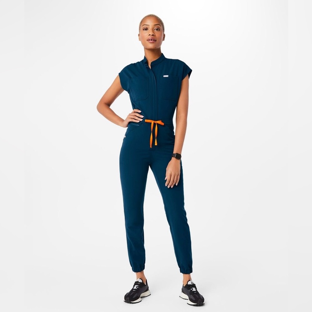 Figs Deep Reef Jumpsuit with Bright Orange Accent